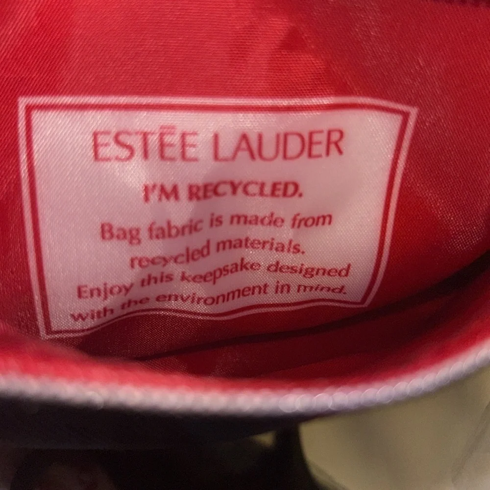 ESTEE LAUDER PLAID COSMETIC BAG WITH POM POM